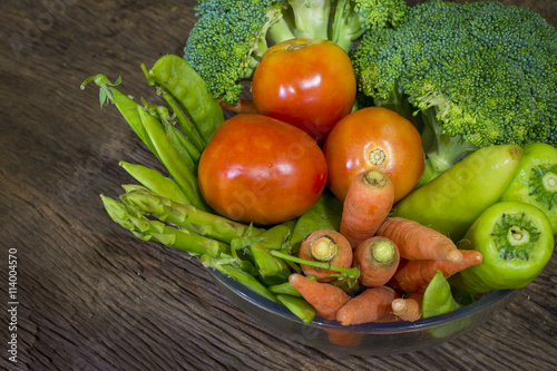 green vegetables on wood background