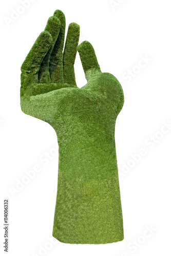green hand made of grass isolated on white background