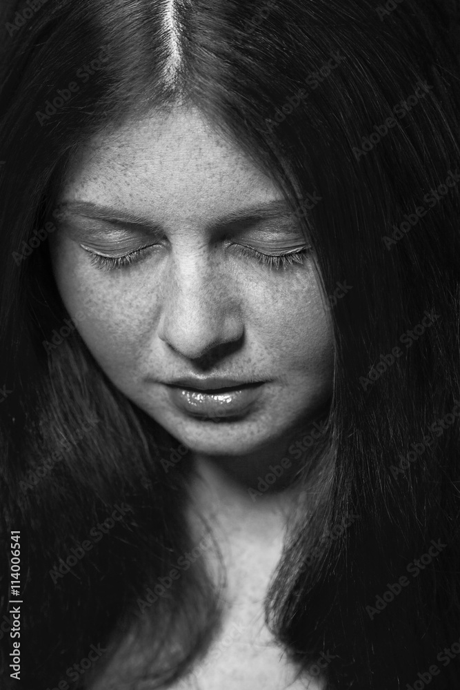 Fototapeta premium Black and white beauty with freckles.