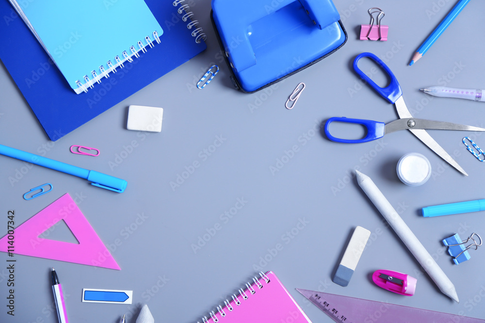 Set of stationery on grey table, top view Set of stationery on grey table, top view