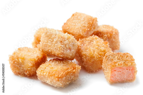 crispy salmon fish nuggets isolated on white