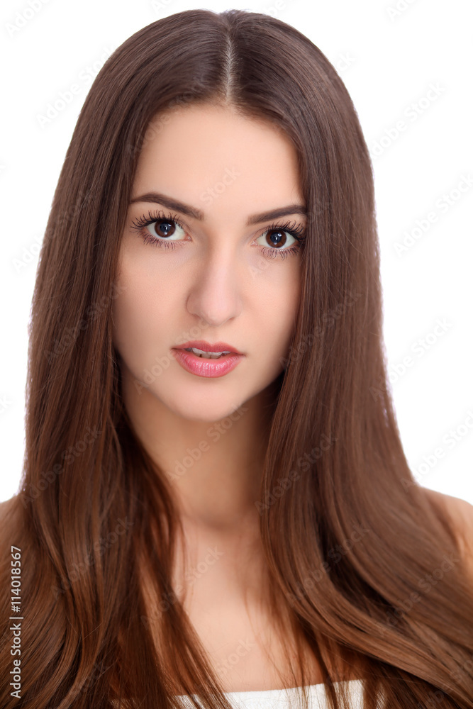 Young beautiful brunette woman face portrait with healthy skin. Isolated background Young beautiful brunette woman face portrait with healthy skin. Isolated background