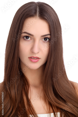 Young beautiful brunette woman face portrait with healthy skin. Isolated background
