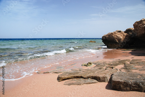 Photo of beautiful clear turquoise sea ocean water surface with ripples low waves on seascape sand beach background, horizontal picture photo