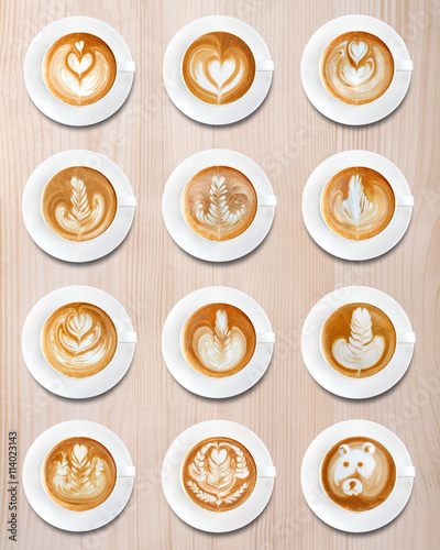  Latte art coffee on brown wood background