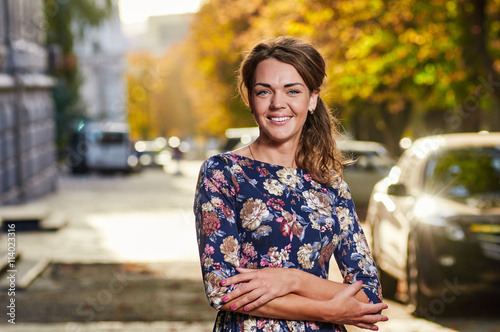 Happy young smile woman city portrait