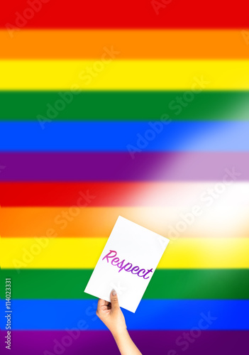 Respect on card with hand holding; LGBT color flag background
