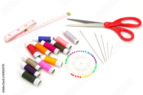 Set of needlework with scissors, needle, thread, measuring tape, pin isolated on white background