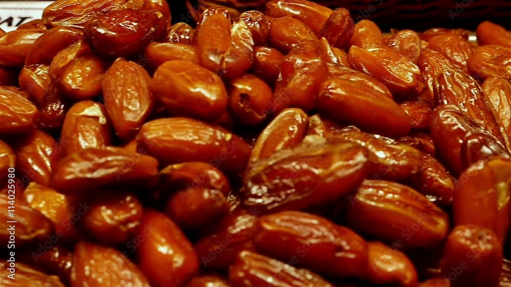 Dolly of dried date fruits in a market Dolly of dried date fruits in a market