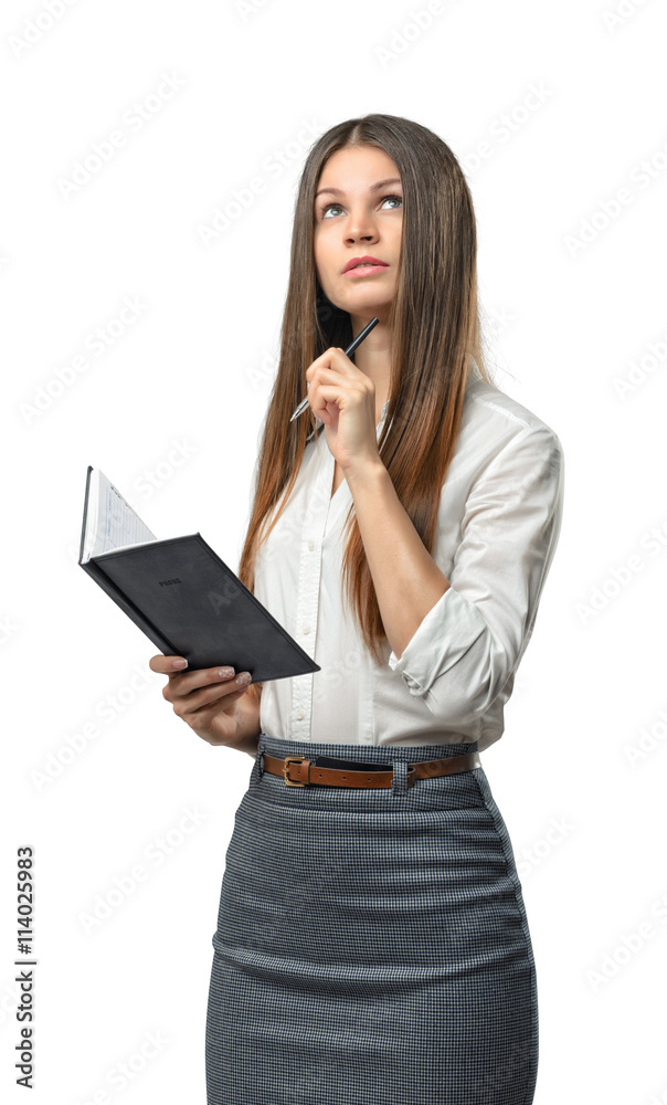 Cutout business woman holding a book and looking away Cutout business woman holding a book and looking away
