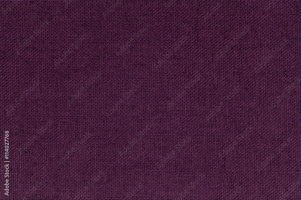 Fototapeta premium Dark burgundy, purple background from a textile material. Fabric with natural texture. Backdrop.