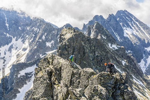 Scrambling for a difficult ridge.