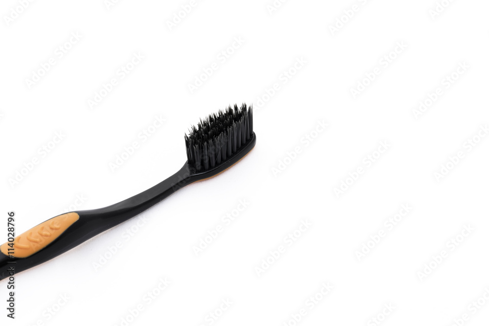 Used Black Toothbrush isolate on white - close up with copy space