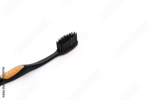 Used Black Toothbrush isolate on white - close up with copy space