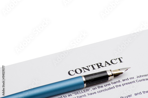 Close-up of pen on contract 