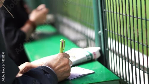 Horse or dog racing gambling hand check points and radio active. Abstract gamble photo