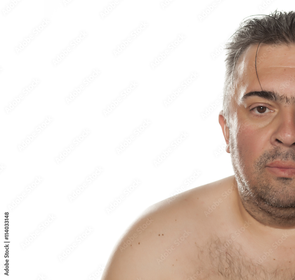 Fototapeta premium Half portrait of a serious obese man