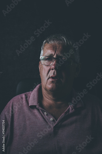Older depressed man, selective focus,
