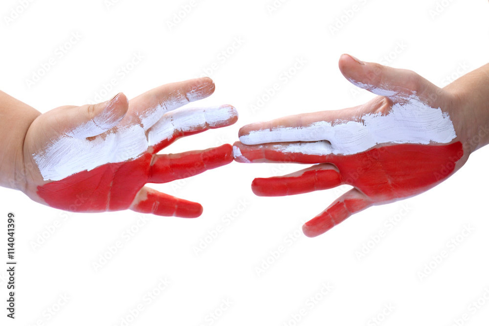 Childrens hands painted Polish flag -white and red. Isolated on white