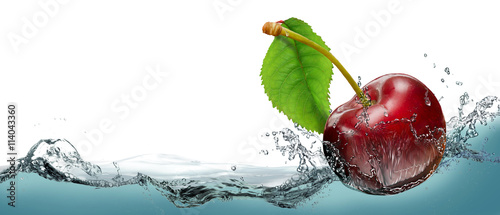Juicy cherry berry in a spray of cool water. © PRUSSIA ART