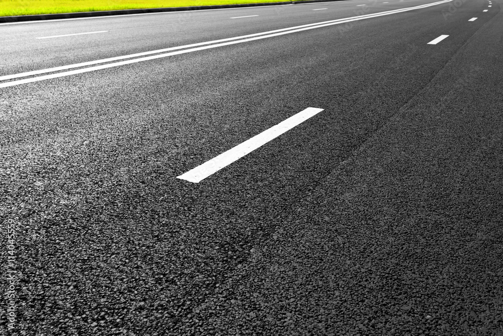 Asphalt road with marking lines white stripes