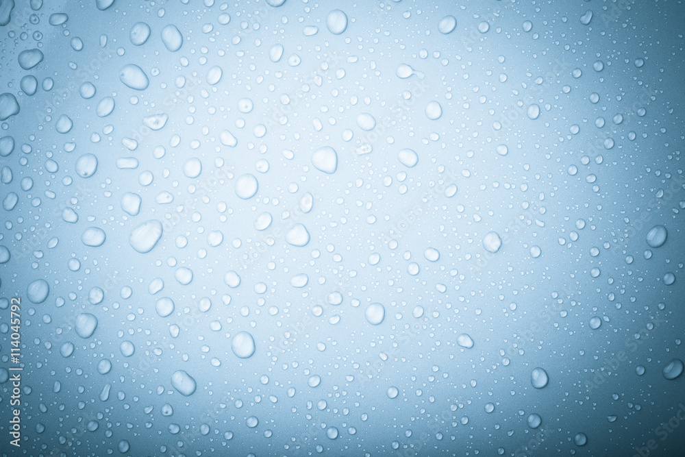 Drops of water on a color background. Blue. Selective focus. Ton Drops of water on a color background. Blue. Selective focus. Ton