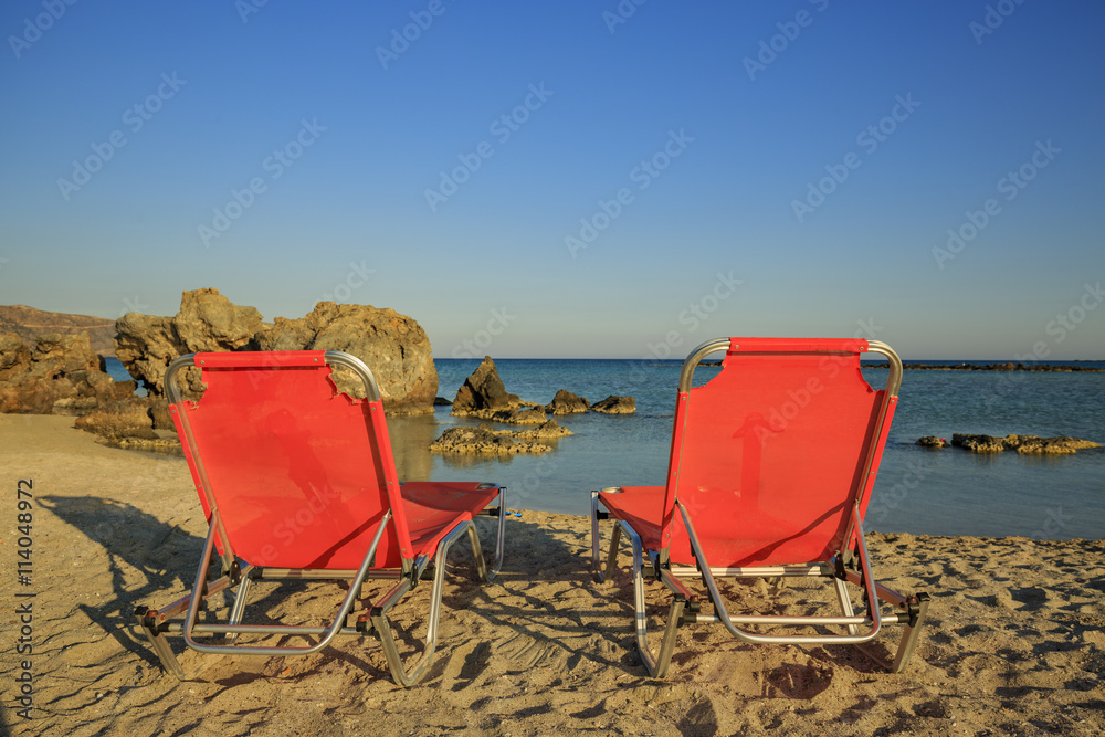 Deck chairs on the Elafonisi beach, Crete, Greece