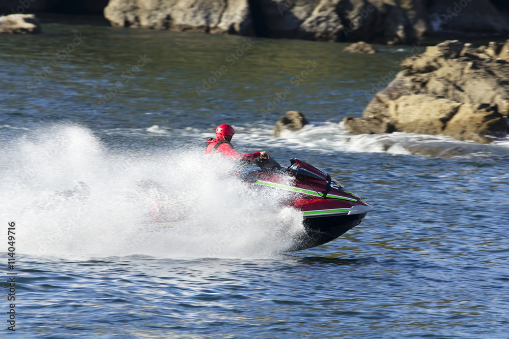 Fototapeta premium lifeguards in jet ski in rescue training