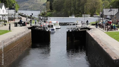 Lock gates opening Caledonian Canal Fort Augustus Scotland UK near Loch Ness