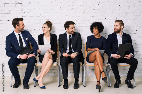 Happy business people waiting for job interview