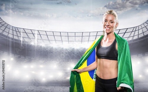 Composite image of athlete with brazilian flag