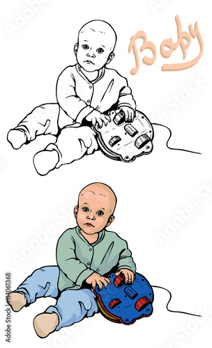 baby plays with a toy