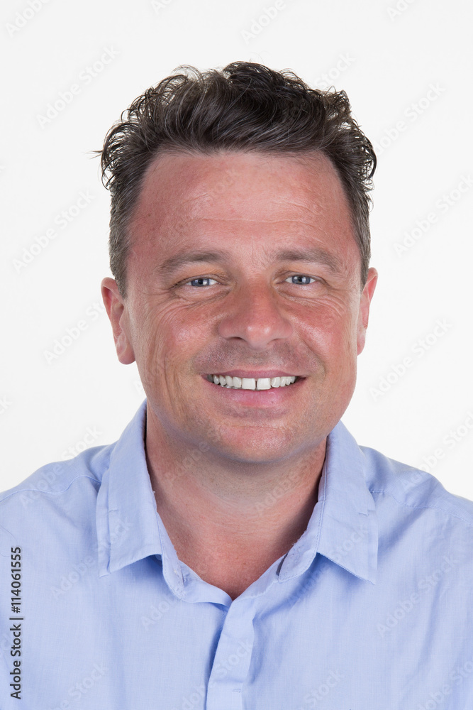 Handsome man smiling. Isolated over white background Handsome man smiling. Isolated over white background