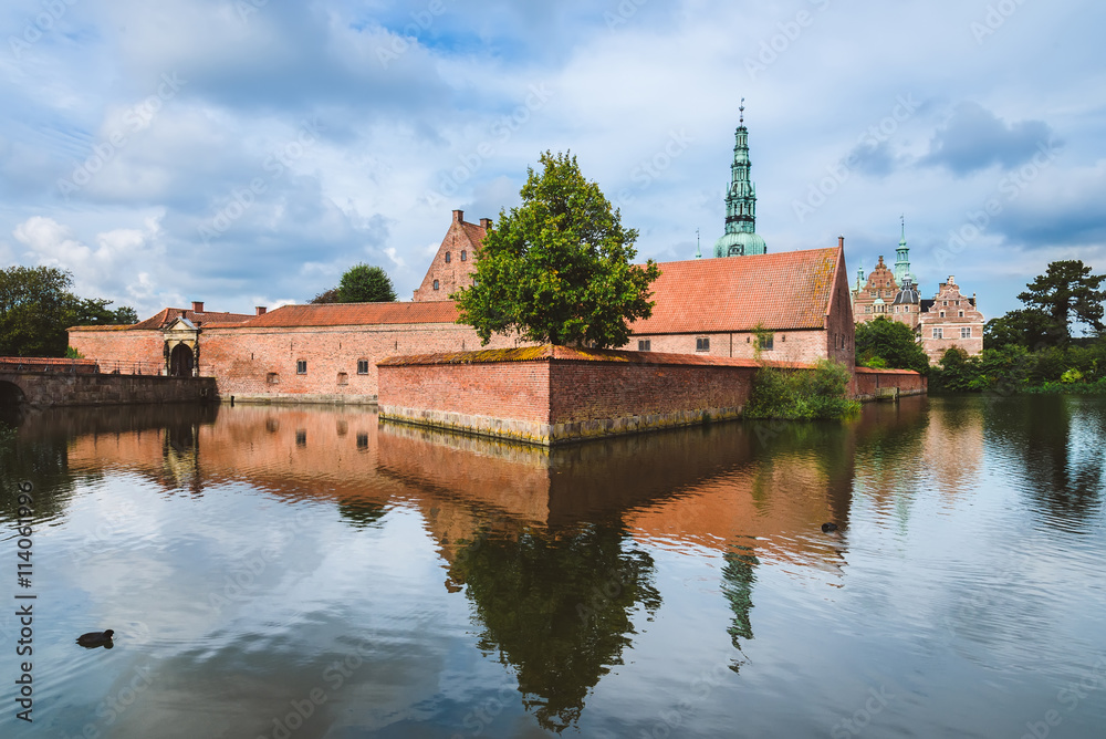 Frederiksborg castle reflected in the lake in Copenhagen, Denmark