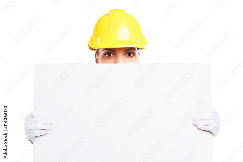 Woman builder in the blue uniform Woman builder in the blue uniform