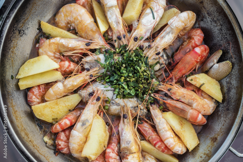 prawn fish seafood stew in garlic white wine sauce prawn fish seafood stew in garlic white wine sauce