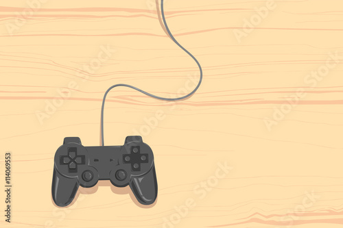 controller on wooden plate