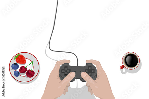 controller in händen mit obst und kaffee