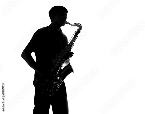Canvas Print silhouette of a man playing the sax