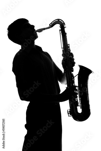 silhouette of a man playing the sax