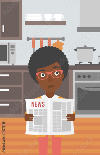 Woman reading newspaper.