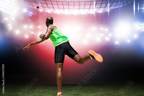 Composite image of rear view of sportsman throwing a shot © vectorfusionart
