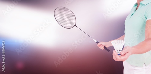 Composite image of pretty blonde playing badminton   © vectorfusionart