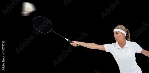 Female athlete playing badminton © vectorfusionart