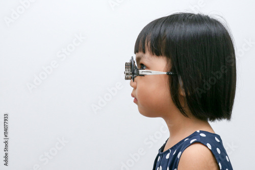 Asian Little Chinese Girl Doing Eyes Examination