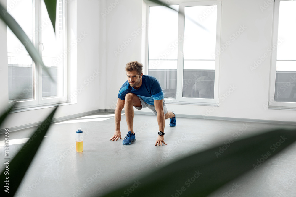 Stretch Exercise. Handsome Healthy Man Stretching Before Workout Stretch Exercise. Handsome Healthy Man Stretching Before Workout