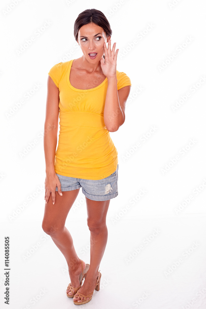 Surprised brunette with hands to mouth Surprised brunette with hands to mouth