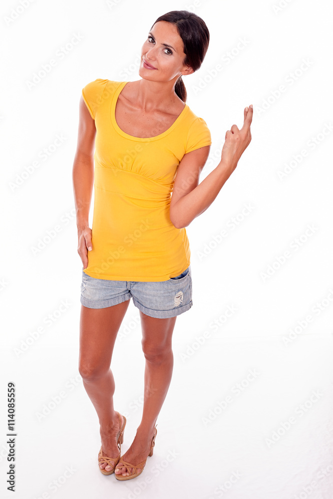 Wishing brunette woman with fingers crossed Wishing brunette woman with fingers crossed