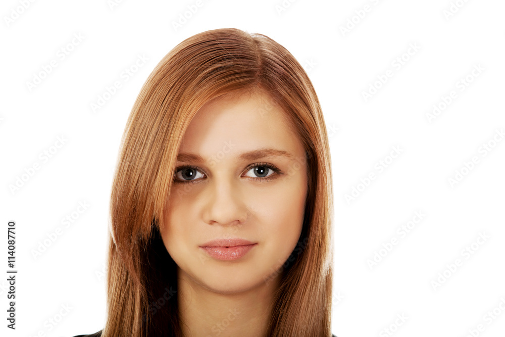 Pretty teenager girl smiling in cheerful mood Pretty teenager girl smiling in cheerful mood