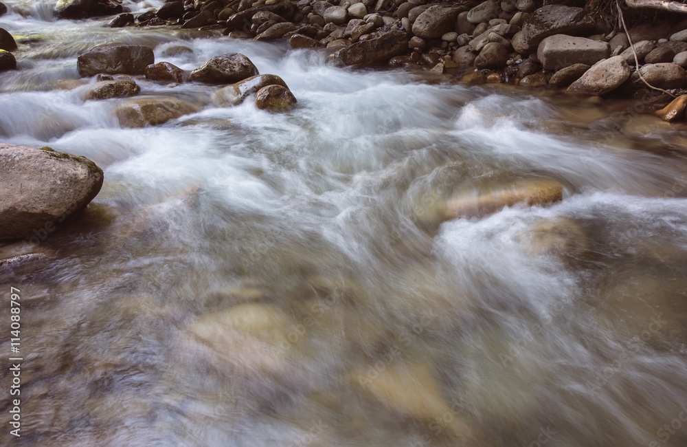 nice beautiful mountain stream with green stones nice beautiful mountain stream with green stones